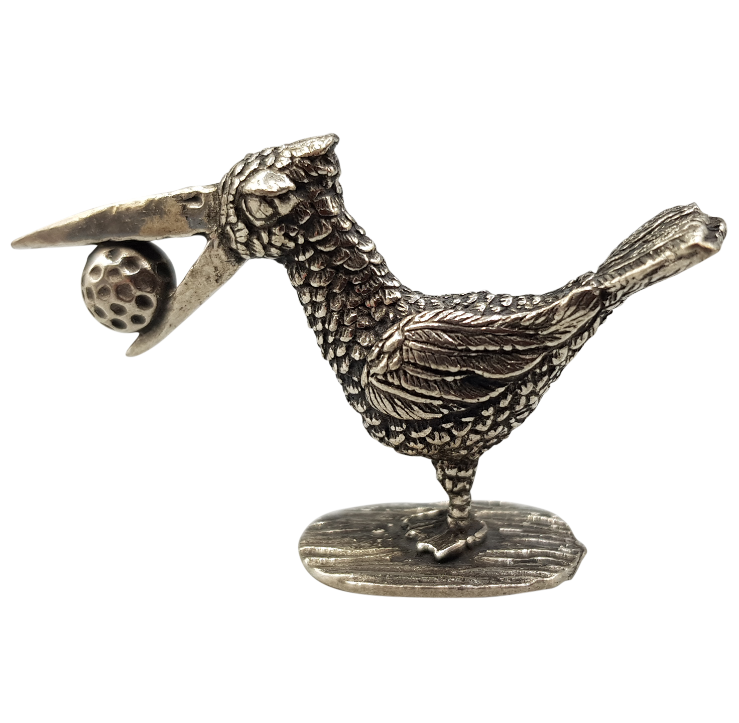 Tinnen birdie met golfbal